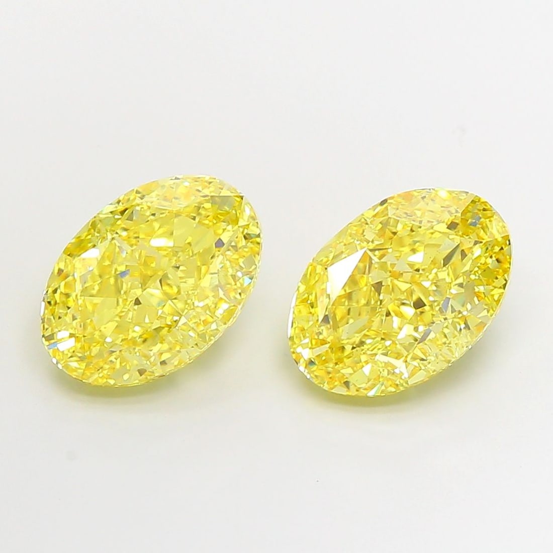 Loose Diamond - OVAL 6.03ct Fancy Vivid Yellow VS1: Loose Diamond - OVAL 6.03ct Fancy Vivid Yellow VS1 Source: This is a real non-mined Diamond that has been grown in a lab Shape: OVAL Carats: 6.03 Color: Fancy Vivid Yellow Certification: IGI Video: