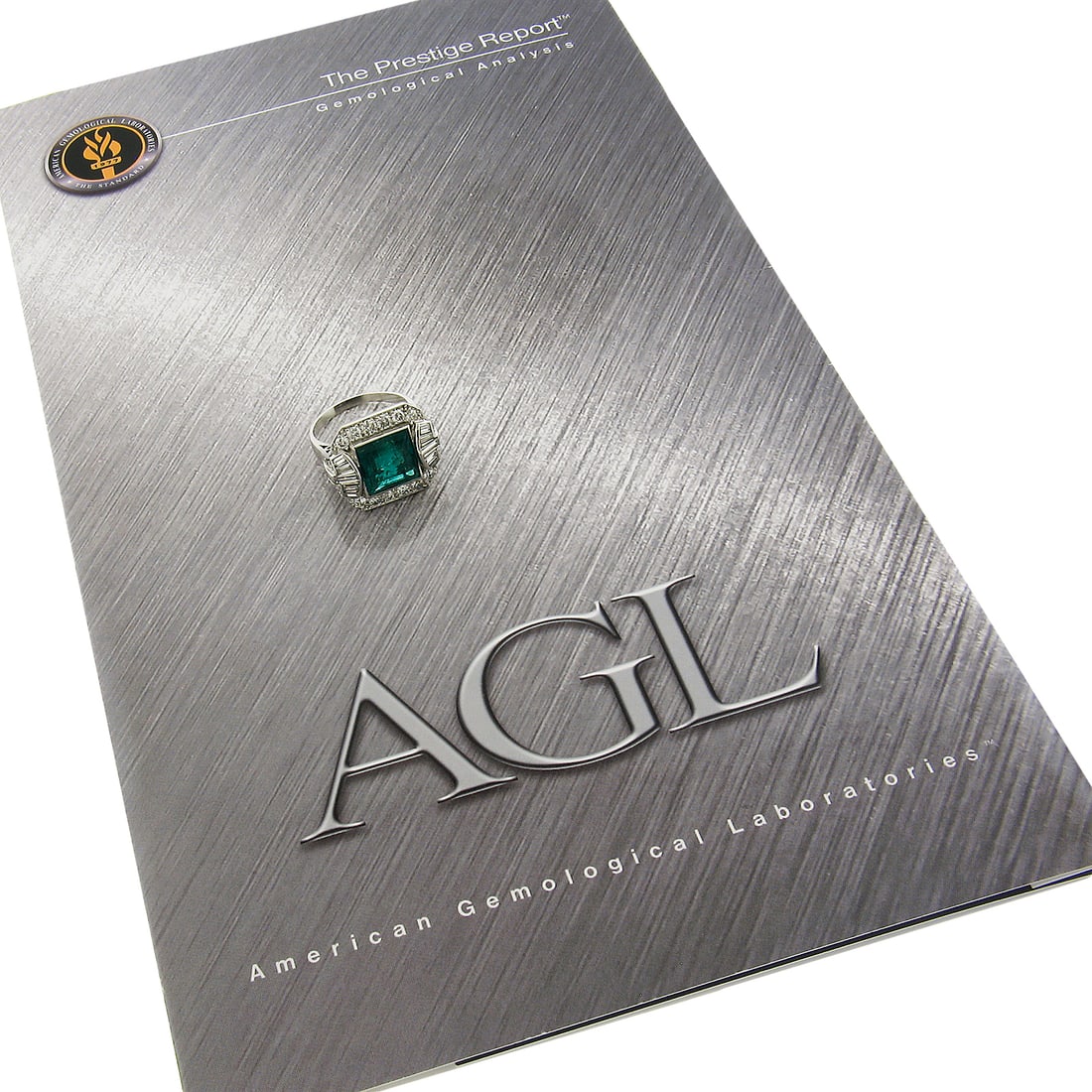 Vintage Platinum 5.2ctw AGL Colombian Emerald Diamond Cocktail Ring: Vintage Platinum 5.2ctw AGL Colombian Emerald Diamond Cocktail Ring This exquisite vintage cocktail ring showcases a stunning 4ct natural Colombian emerald, beautifully bezel set at its center. The em