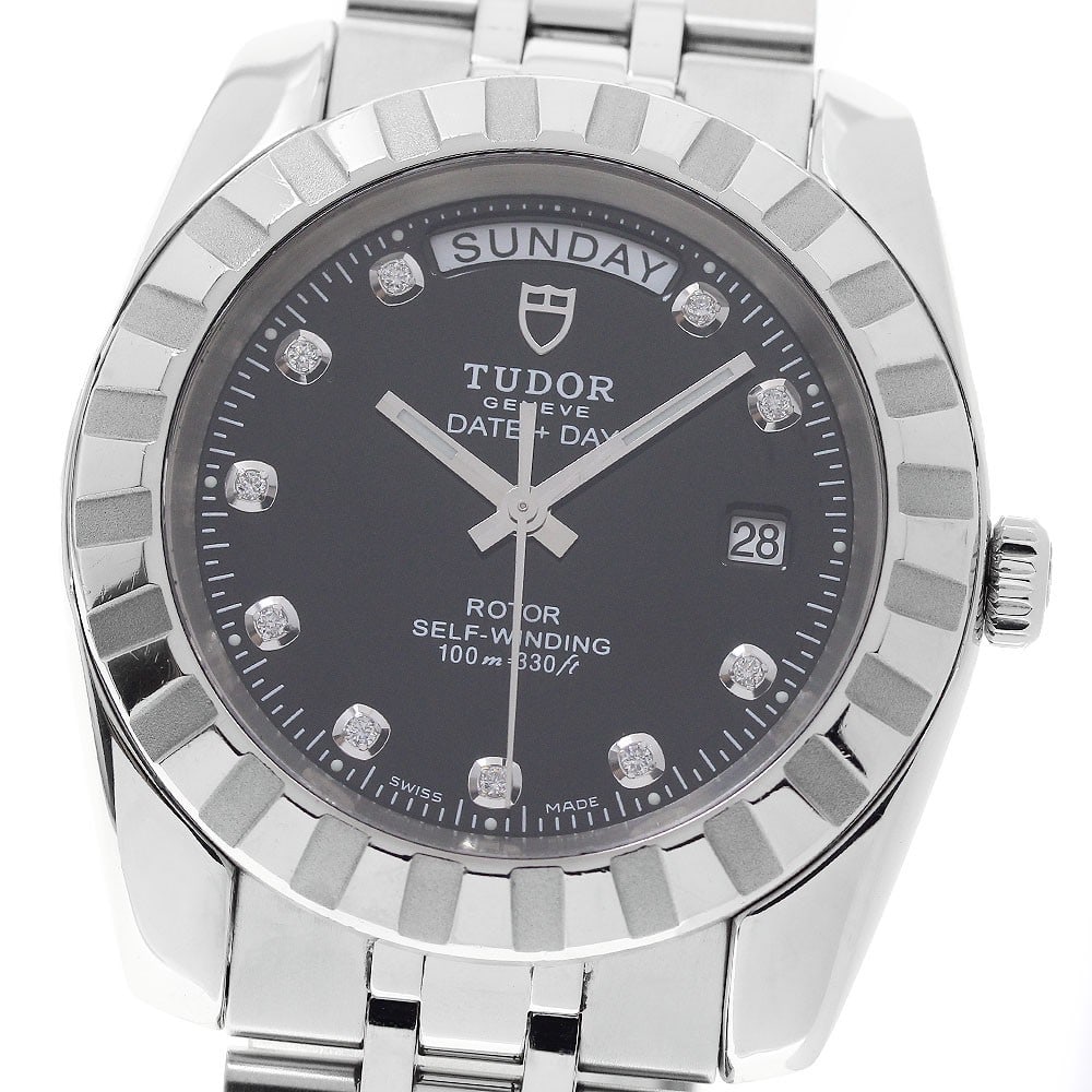 TUDOR Classic Date-Day Ref 23010 Mens Automatic Wristwatch: TUDOR Classic Date-Day Ref 23010 Mens Automatic Wristwatch TUDOR Classic Date-Day men's wristwatch with automatic movement and a black dial. This stainless steel watch features a day-date display. Con