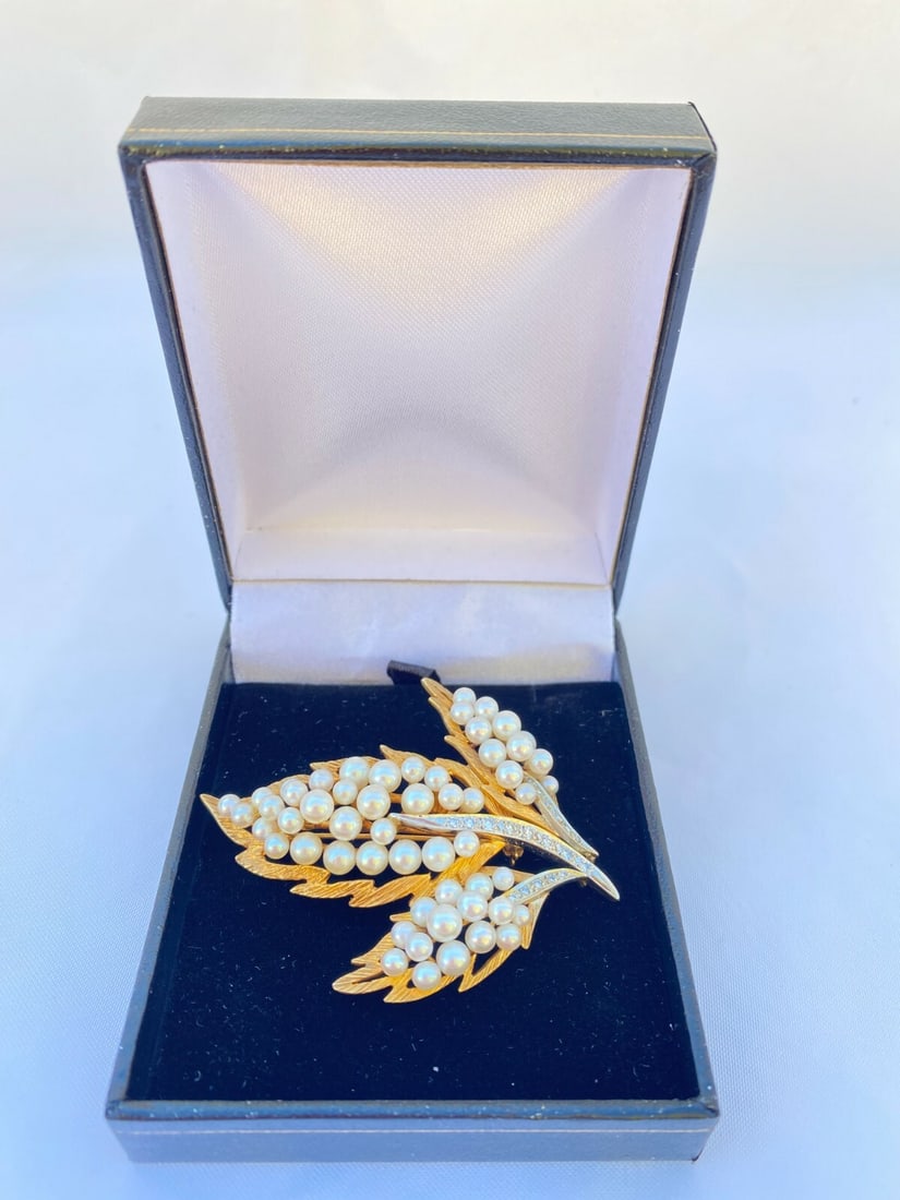 French Diamond Pearl Brooch Pendant in 14K Yellow and 18K White Gold: French Diamond Pearl Brooch Pendant in 14K Yellow and 18K White Gold French brooch pendant crafted in 14K yellow gold and 18K white gold, accented with diamonds and pearls. This pre-owned piece featur