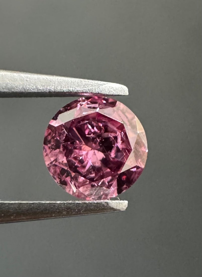 Loose Diamond - ROUND 0.16ct Fancy Vivid Purplish Pink I3: Loose Diamond - ROUND 0.16ct Fancy Vivid Purplish Pink I3 Source: Natural Shape: ROUND Carats: 0.16 Color: Fancy Vivid Purplish Pink Certification: GIA The Diamond Depot Guarantee: All items in this a
