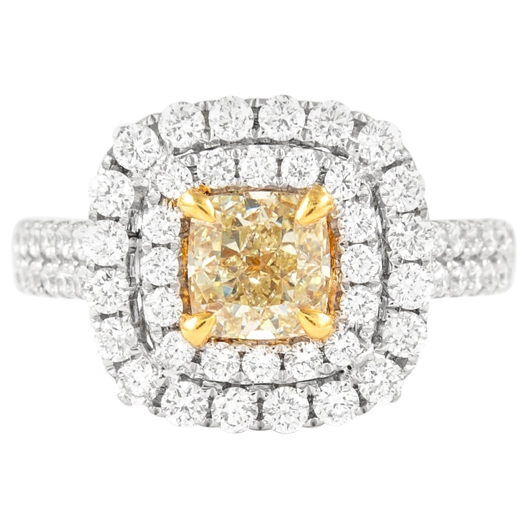 18k Gold Fancy Yellow Diamond Double Halo Ring 2.08ctt: 18k Gold Fancy Yellow Diamond Double Halo Ring 2.08ctt Contemporary double halo ring featuring an EGL-certified Fancy Yellow VS1 cushion-cut diamond at the center, accented by round brilliant diamonds
