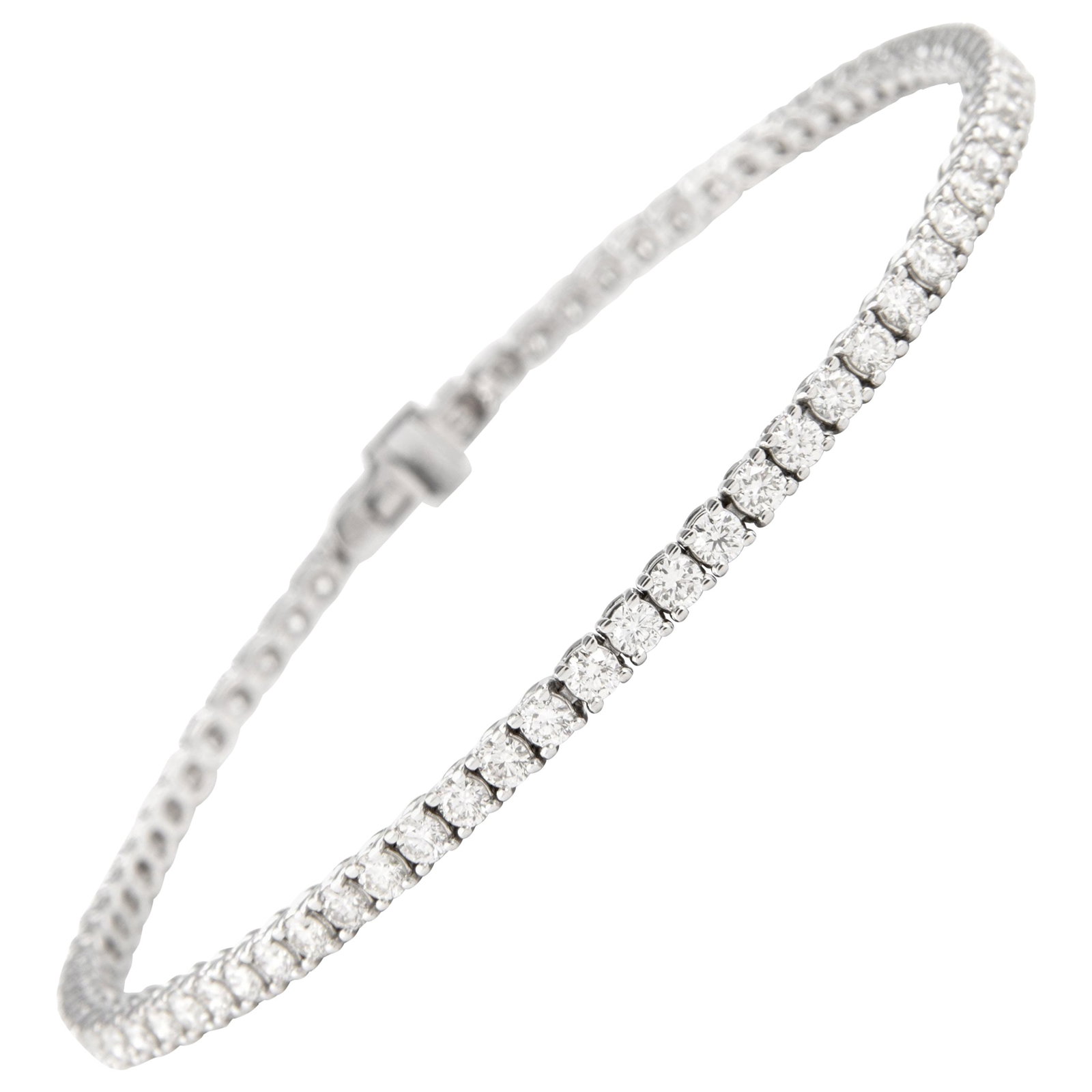 14k White Gold 2.71ct Diamond Tennis Bracelet: 14k White Gold 2.71ct Diamond Tennis Bracelet Contemporary diamond tennis bracelet set with 74 round brilliant white diamonds totaling 2.71 ct in 14k white gold. The bracelet measures 7 inches in leng