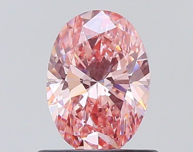 Loose Diamond - OVAL 0.76ct Fancy Light Orangey Pink VVS1: Loose Diamond - OVAL 0.76ct Fancy Light Orangey Pink VVS1 Source: This is a real non-mined Diamond that has been grown in a lab Shape: OVAL Carats: 0.76 Color: Fancy Light Orangey Pink Certification: