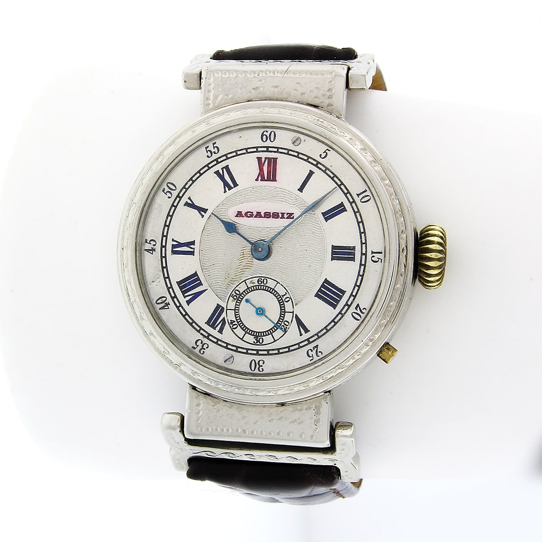 Agassiz 38mm men's wristwatch with 11 jewel hand winding pin set movement: Agassiz 38mm men's wristwatch with 11 jewel hand winding pin set movement Antique Agassiz mechanical hand-wind marriage watch with an 11-jewel pin-set movement in a polished stainless steel wristwatch