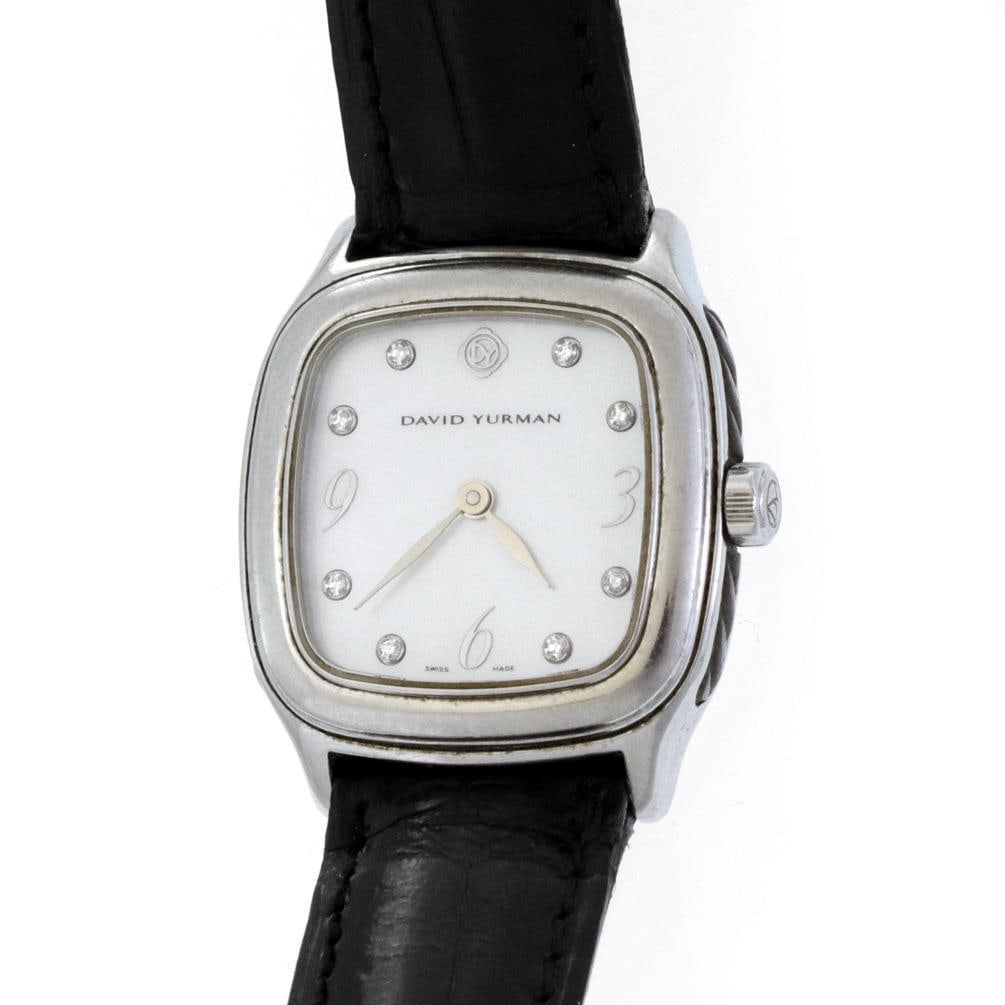 David Yurman T304-XSSt midsize sterling silver quartz watch MOP dial: David Yurman T304-XSSt midsize sterling silver quartz watch MOP dial Discover elegance with this authentic David Yurman midsize wristwatch, expertly crafted with a sterling silver case featuring a pol