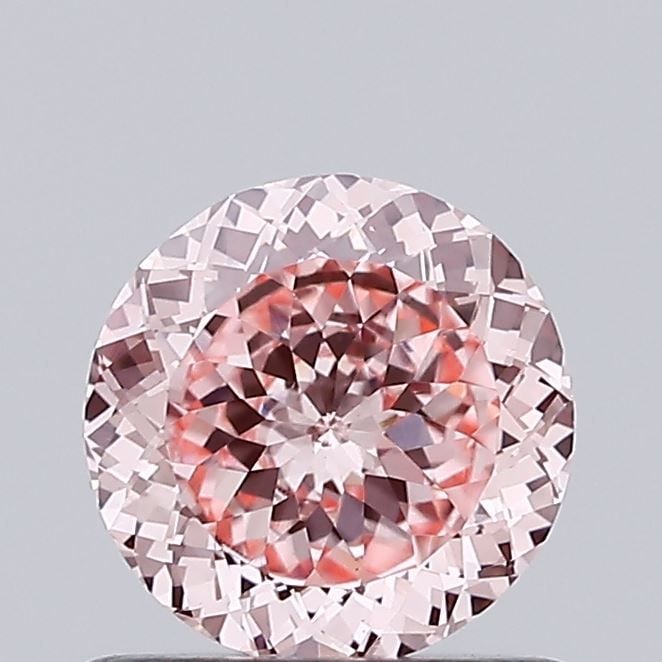 Loose Diamond - ROUND 0.75ct Fancy Intense Pink VS1: Loose Diamond - ROUND 0.75ct Fancy Intense Pink VS1 Source: This is a real non-mined Diamond that has been grown in a lab Shape: ROUND Carats: 0.75 Color: Fancy Intense Pink Certification: IGI Video: