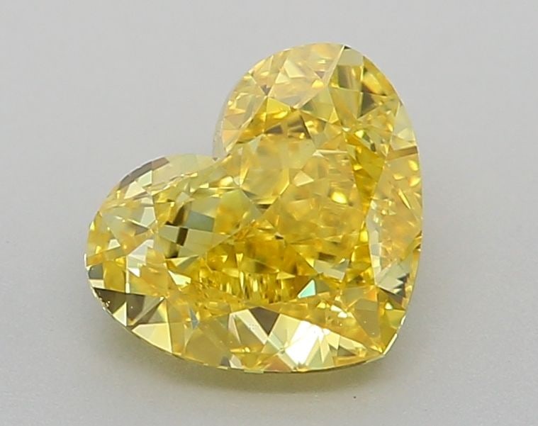 Loose Diamond - HEART 1.03ct Fancy Vivid Yellow VS1: Loose Diamond - HEART 1.03ct Fancy Vivid Yellow VS1 Source: This is a real non-mined Diamond that has been grown in a lab Shape: HEART Carats: 1.03 Color: Fancy Vivid Yellow Certification: IGI Video: