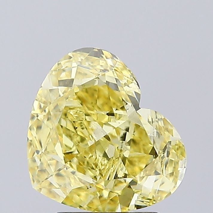 Loose Diamond - HEART 2.52ct Fancy Intense Yellow VS1: Loose Diamond - HEART 2.52ct Fancy Intense Yellow VS1 Source: This is a real non-mined Diamond that has been grown in a lab Shape: HEART Carats: 2.52 Color: Fancy Intense Yellow Certification: IGI Vid