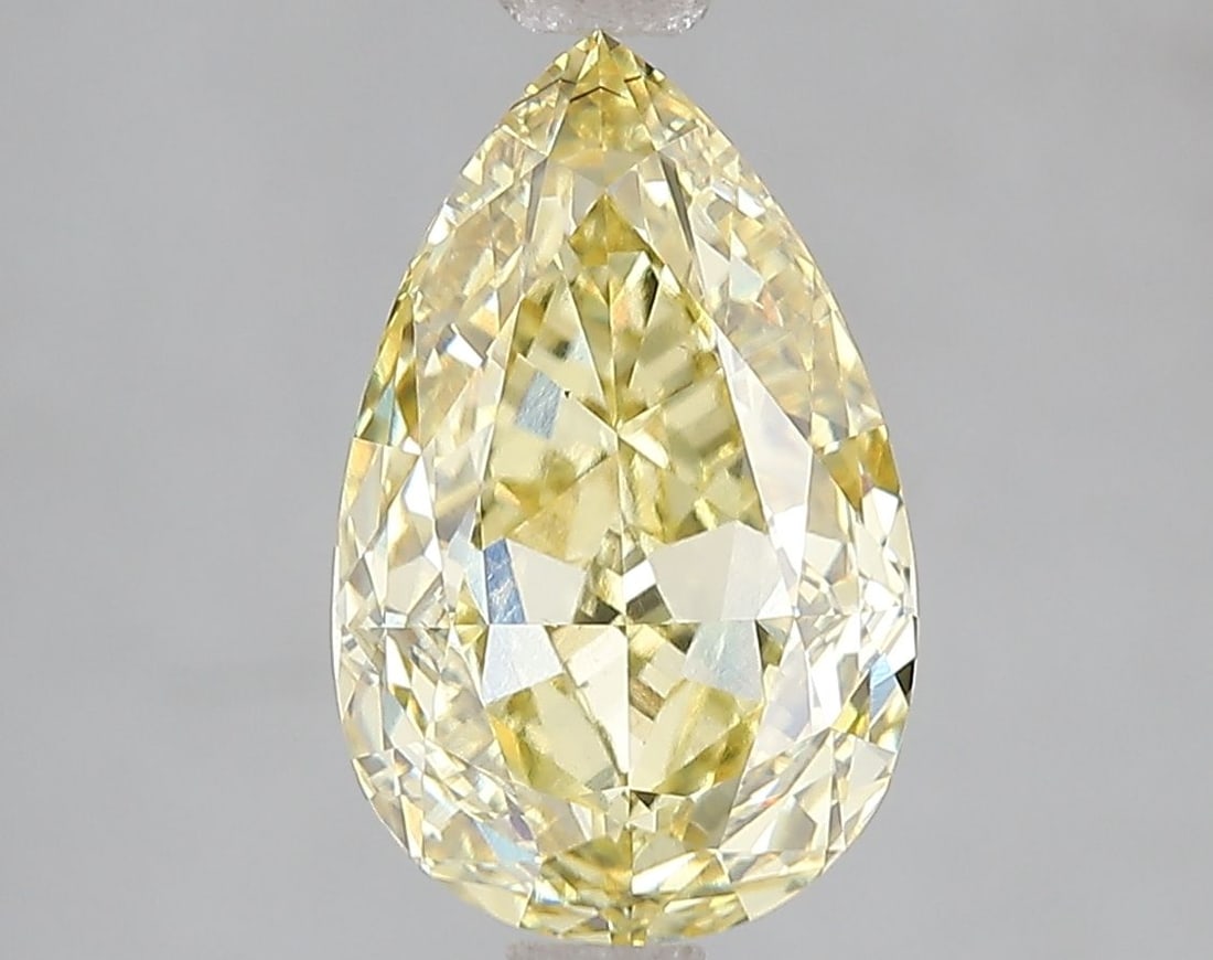 Loose Diamond - PEAR 3.01ct Fancy Vivid Yellow VS2: Loose Diamond - PEAR 3.01ct Fancy Vivid Yellow VS2 Source: This is a real non-mined Diamond that has been grown in a lab Shape: PEAR Carats: 3.01 Color: Fancy Vivid Yellow Certification: IGI Video: