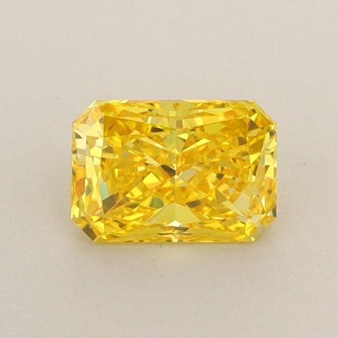 Loose Diamond - RADIANT 0.64ct Fancy Vivid Yellow VS1: Loose Diamond - RADIANT 0.64ct Fancy Vivid Yellow VS1 Source: This is a real non-mined Diamond that has been grown in a lab Shape: RADIANT Carats: 0.64 Color: Fancy Vivid Yellow Certification: IGI Vid