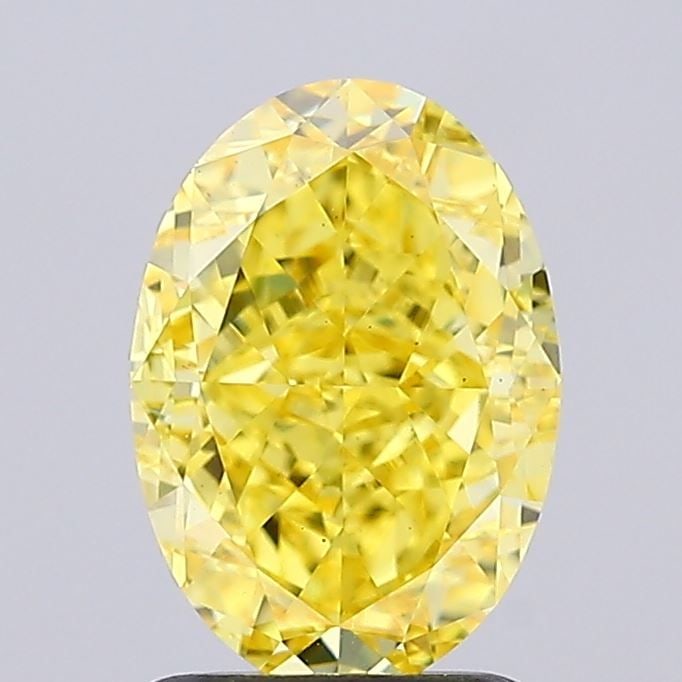 Loose Diamond - OVAL 2.25ct Fancy Vivid Yellow VS1: Loose Diamond - OVAL 2.25ct Fancy Vivid Yellow VS1 Source: This is a real non-mined Diamond that has been grown in a lab Shape: OVAL Carats: 2.25 Color: Fancy Vivid Yellow Certification: IGI Video: