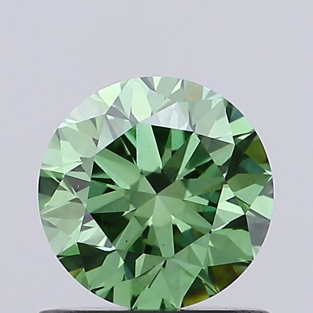 Loose Diamond - ROUND 0.82ct Fancy Vivid Green VS1: Loose Diamond - ROUND 0.82ct Fancy Vivid Green VS1 Source: This is a real non-mined Diamond that has been grown in a lab Shape: ROUND Carats: 0.82 Color: Fancy Vivid Green Certification: IGI Video: