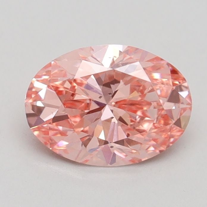 Loose Diamond - OVAL 0.9ct Fancy Vivid Pink SI1: Loose Diamond - OVAL 0.9ct Fancy Vivid Pink SI1 Source: This is a real non-mined Diamond that has been grown in a lab Shape: OVAL Carats: 0.9 Color: Fancy Vivid Pink Certification: IGI Video: Video