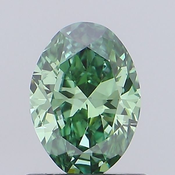 Loose Diamond - OVAL 0.7ct Fancy Vivid Green VVS2: Loose Diamond - OVAL 0.7ct Fancy Vivid Green VVS2 Source: This is a real non-mined Diamond that has been grown in a lab Shape: OVAL Carats: 0.7 Color: Fancy Vivid Green Certification: IGI Video: