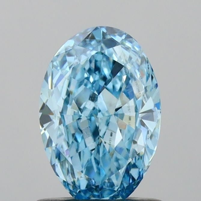 Loose Diamond - OVAL 1.01ct Fancy Vivid Blue VVS2: Loose Diamond - OVAL 1.01ct Fancy Vivid Blue VVS2 Source: This is a real non-mined Diamond that has been grown in a lab Shape: OVAL Carats: 1.01 Color: Fancy Vivid Blue Certification: IGI Video: