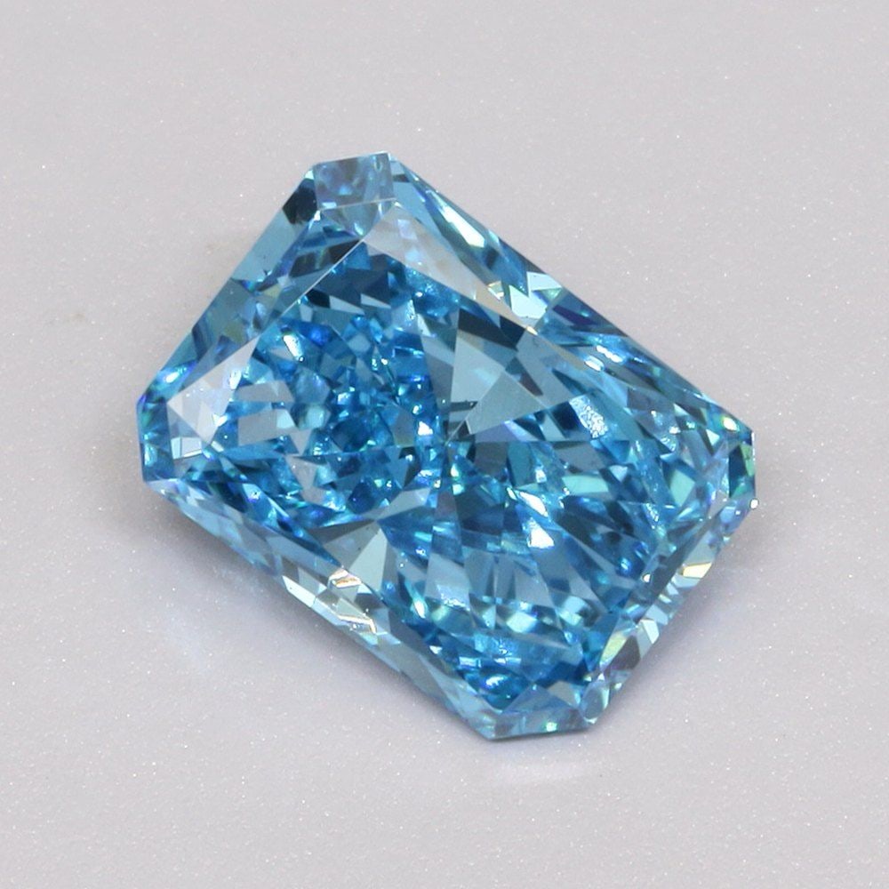 Loose Diamond - RADIANT 1.5ct Fancy Vivid Blue VS1: Loose Diamond - RADIANT 1.5ct Fancy Vivid Blue VS1 Source: This is a real non-mined Diamond that has been grown in a lab Shape: RADIANT Carats: 1.5 Color: Fancy Vivid Blue Certification: IGI Video: