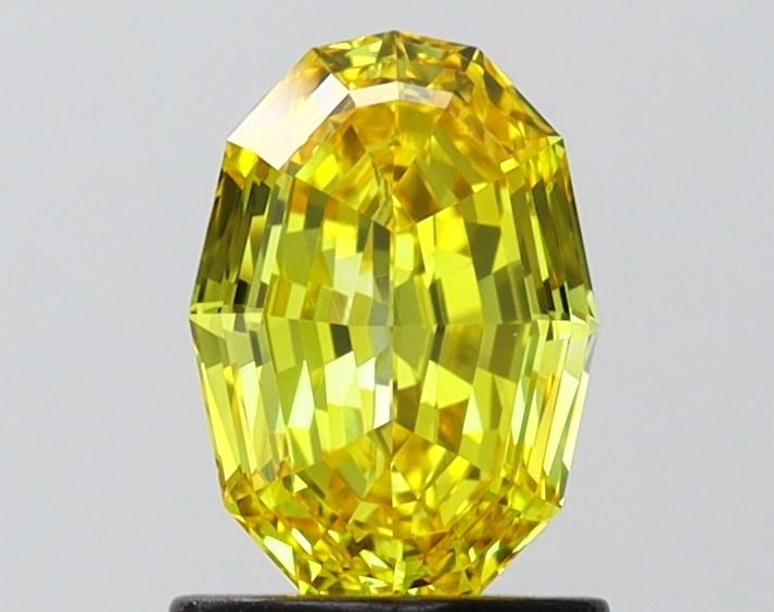 Loose Diamond - OTHER 1.14ct Fancy Vivid Yellow VVS1: Loose Diamond - OTHER 1.14ct Fancy Vivid Yellow VVS1 Source: This is a real non-mined Diamond that has been grown in a lab Shape: OTHER Carats: 1.14 Color: Fancy Vivid Yellow Certification: IGI Video: