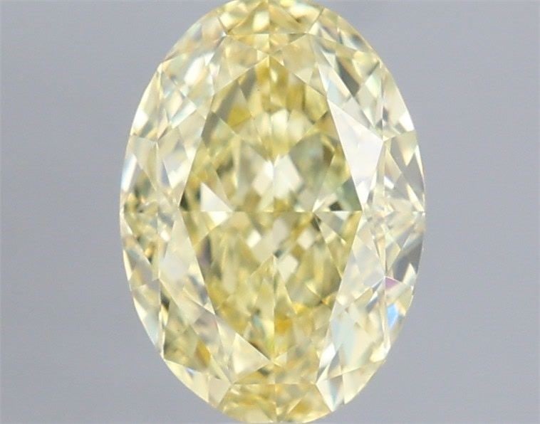 Loose Diamond - OVAL 1.06ct Fancy Yellow VVS2: Loose Diamond - OVAL 1.06ct Fancy Yellow VVS2 Source: This is a real non-mined Diamond that has been grown in a lab Shape: OVAL Carats: 1.06 Color: Fancy Yellow Certification: IGI Video: