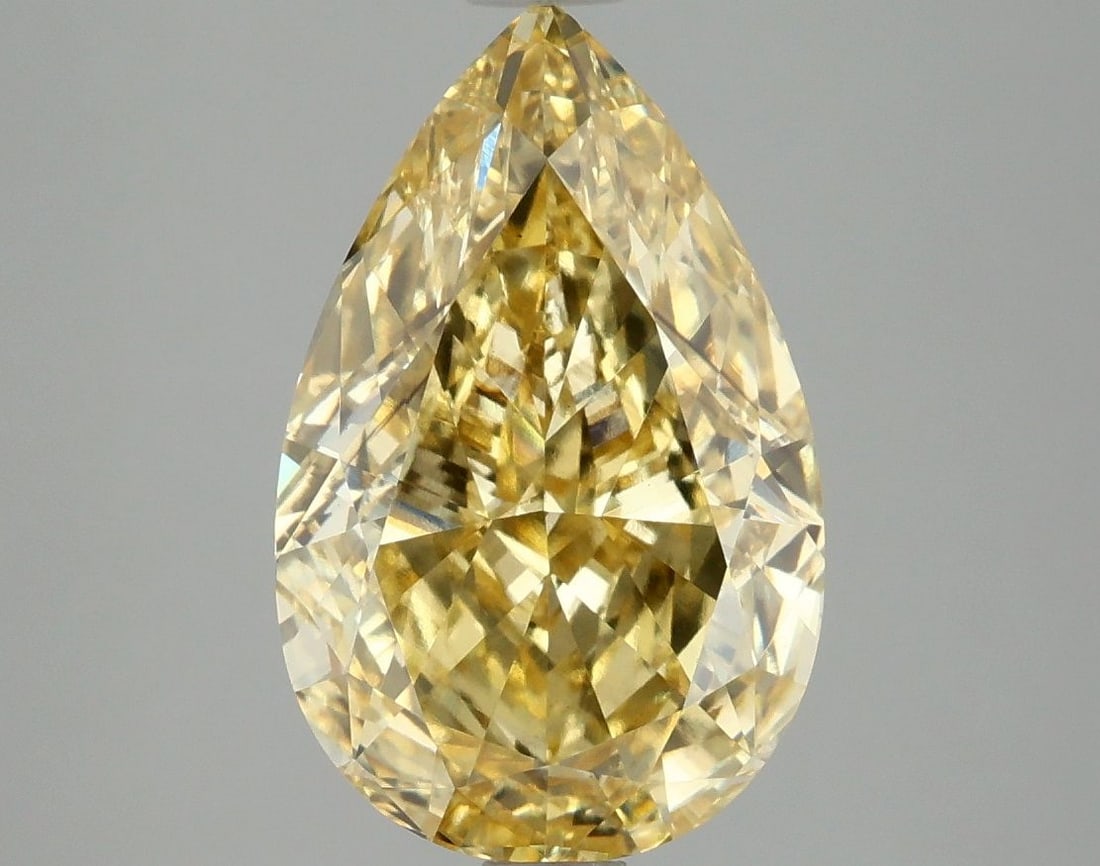 Loose Diamond - PEAR 4.04ct Fancy Vivid Yellow VS2: Loose Diamond - PEAR 4.04ct Fancy Vivid Yellow VS2 Source: This is a real non-mined Diamond that has been grown in a lab Shape: PEAR Carats: 4.04 Color: Fancy Vivid Yellow Certification: IGI Video: