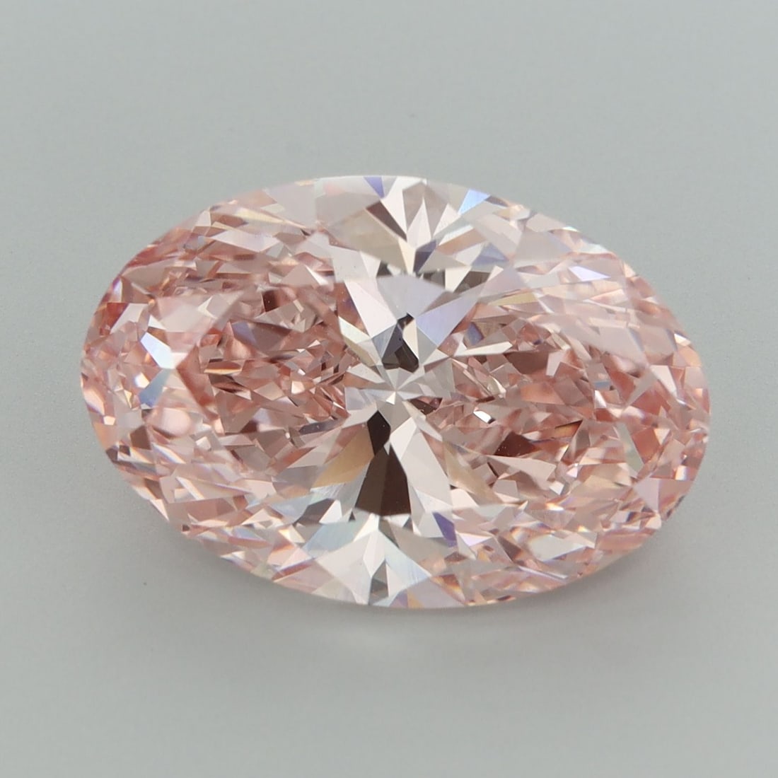 Loose Diamond - OVAL 7.98ct Fancy Vivid Pink VS1: Loose Diamond - OVAL 7.98ct Fancy Vivid Pink VS1 Source: This is a real non-mined Diamond that has been grown in a lab Shape: OVAL Carats: 7.98 Color: Fancy Vivid Pink Certification: IGI Video: