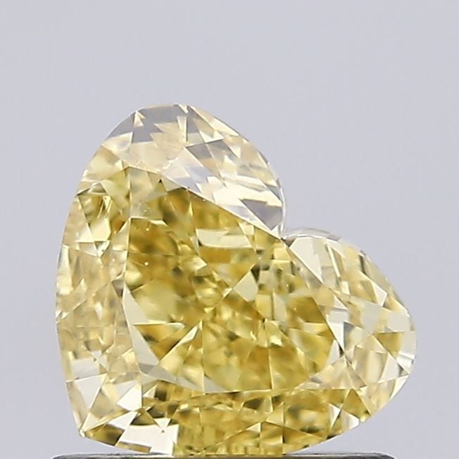 Loose Diamond - HEART 0.87ct Fancy Vivid Yellow VVS2: Loose Diamond - HEART 0.87ct Fancy Vivid Yellow VVS2 Source: This is a real non-mined Diamond that has been grown in a lab Shape: HEART Carats: 0.87 Color: Fancy Vivid Yellow Certification: NONE Video