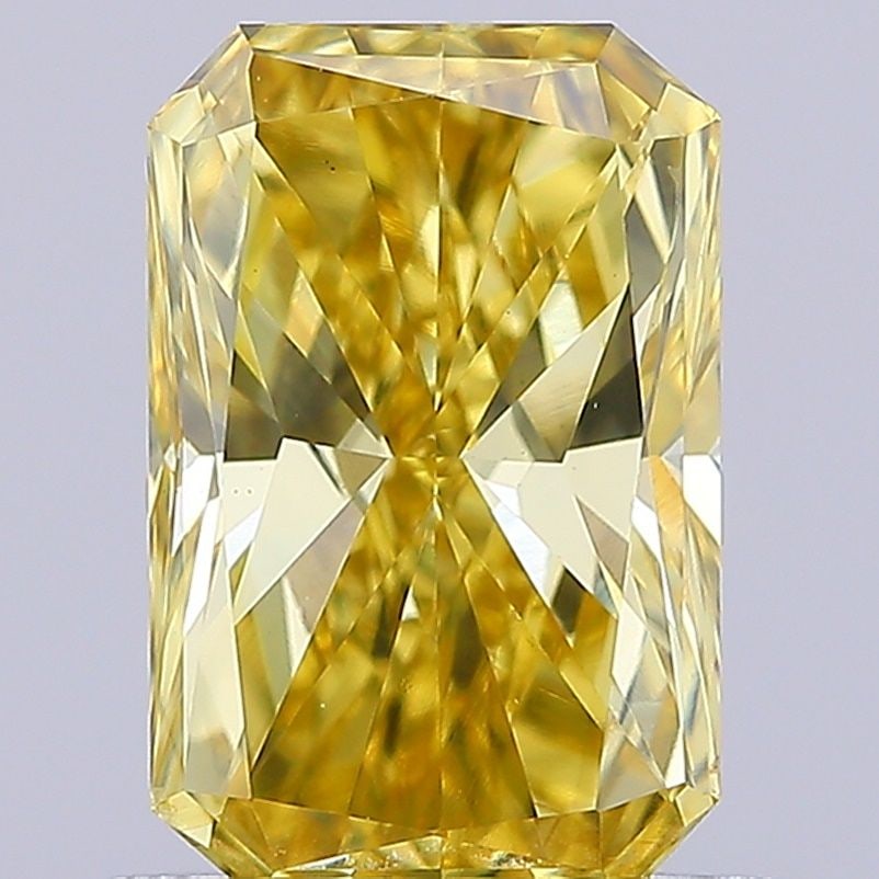 Loose Diamond - RADIANT 0.89ct Fancy Vivid Yellow VS1: Loose Diamond - RADIANT 0.89ct Fancy Vivid Yellow VS1 Source: This is a real non-mined Diamond that has been grown in a lab Shape: RADIANT Carats: 0.89 Color: Fancy Vivid Yellow Certification: IGI Vid