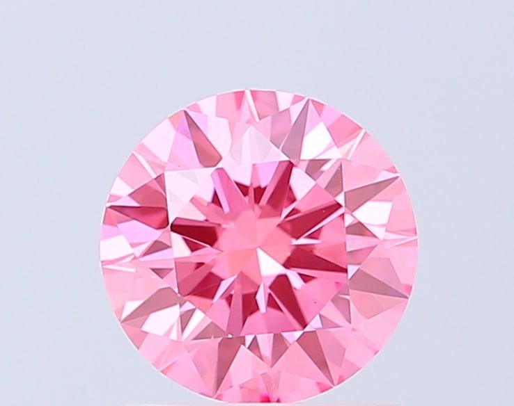 Ideal Loose Diamond - ROUND 1.42ct Fancy Vivid Pink VVS2: Ideal Loose Diamond - ROUND 1.42ct Fancy Vivid Pink VVS2 Source: This is a real non-mined Diamond that has been grown in a lab Shape: ROUND Carats: 1.42 Color: Fancy Vivid Pink Certification: IGI The 