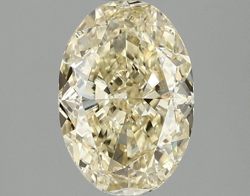 Loose Diamond - OVAL 2.1ct Fancy Yellow VS1: Loose Diamond - OVAL 2.1ct Fancy Yellow VS1 Source: This is a real non-mined Diamond that has been grown in a lab Shape: OVAL Carats: 2.1 Color: Fancy Yellow Certification: IGI Video: