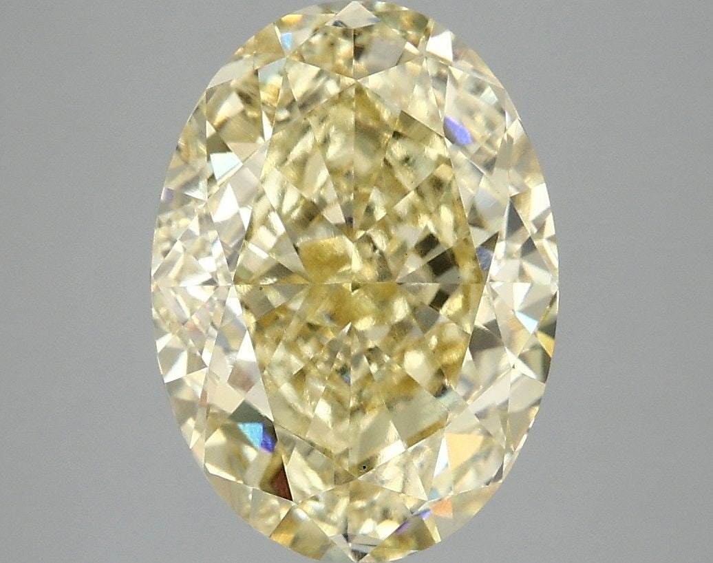 Loose Diamond - OVAL 5.09ct Fancy Yellow VS1: Loose Diamond - OVAL 5.09ct Fancy Yellow VS1 Source: This is a real non-mined Diamond that has been grown in a lab Shape: OVAL Carats: 5.09 Color: Fancy Yellow Certification: IGI Video: