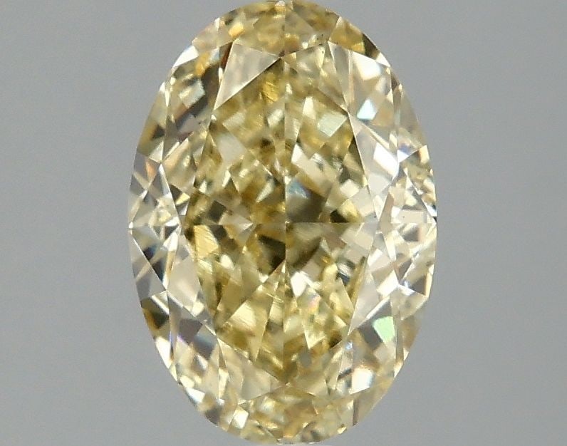 Loose Diamond - OVAL 2.07ct Fancy Intense Yellow VS1: Loose Diamond - OVAL 2.07ct Fancy Intense Yellow VS1 Source: This is a real non-mined Diamond that has been grown in a lab Shape: OVAL Carats: 2.07 Color: Fancy Intense Yellow Certification: IGI Video