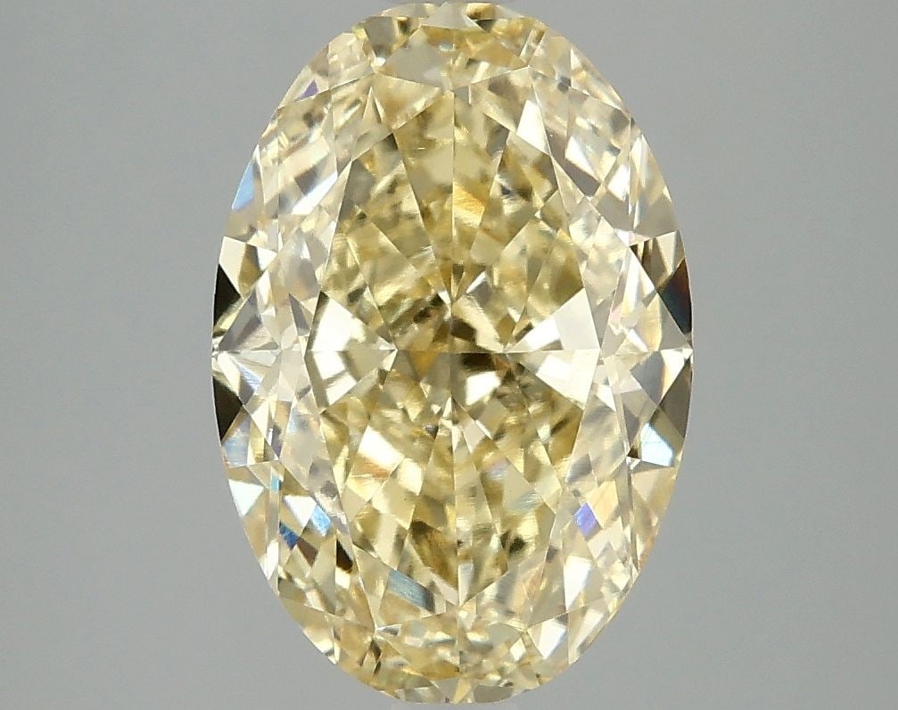 Loose Diamond - OVAL 4.09ct Fancy Vivid Yellow VS1: Loose Diamond - OVAL 4.09ct Fancy Vivid Yellow VS1 Source: This is a real non-mined Diamond that has been grown in a lab Shape: OVAL Carats: 4.09 Color: Fancy Vivid Yellow Certification: IGI Video: