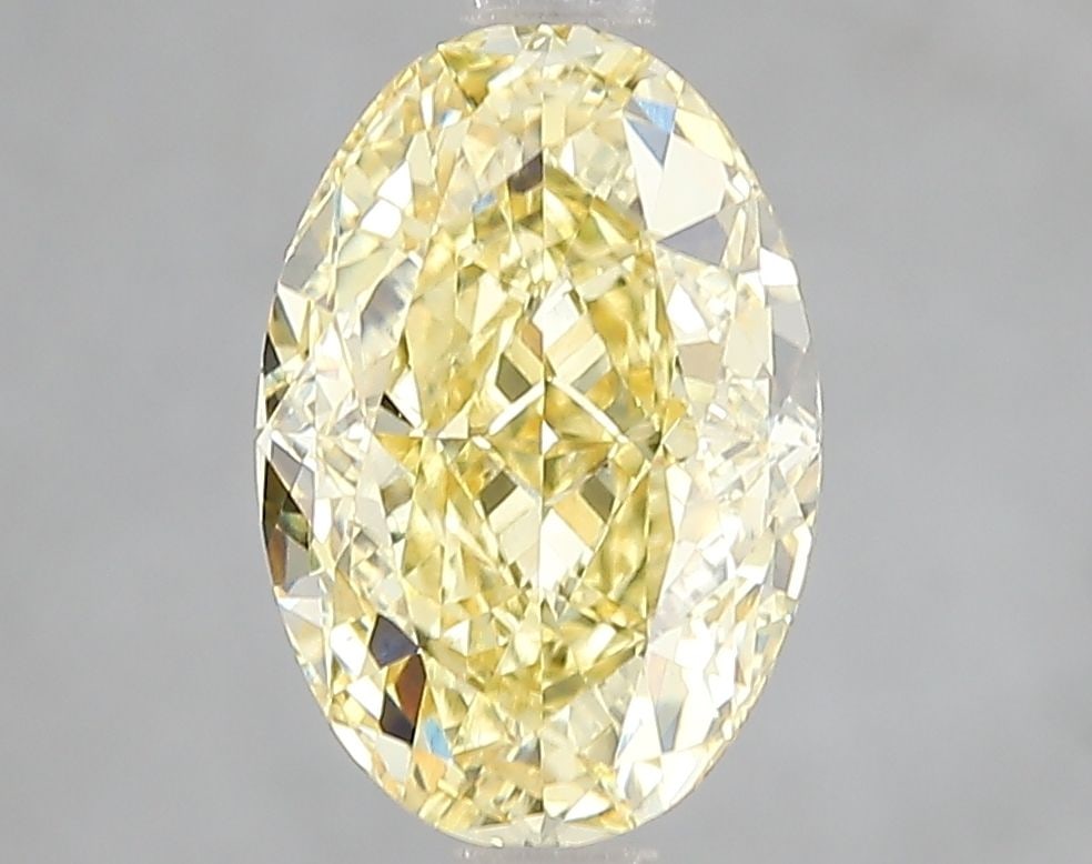 Loose Diamond - OVAL 3.02ct Fancy Vivid Yellow VS1: Loose Diamond - OVAL 3.02ct Fancy Vivid Yellow VS1 Source: This is a real non-mined Diamond that has been grown in a lab Shape: OVAL Carats: 3.02 Color: Fancy Vivid Yellow Certification: IGI Video: