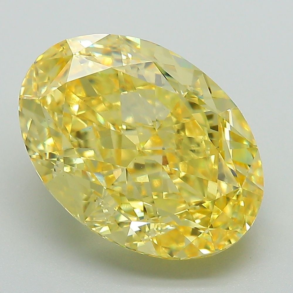 Loose Diamond - OVAL 6.03ct Fancy Vivid Yellow VS1: Loose Diamond - OVAL 6.03ct Fancy Vivid Yellow VS1 Source: This is a real non-mined Diamond that has been grown in a lab Shape: OVAL Carats: 6.03 Color: Fancy Vivid Yellow Certification: IGI Video: