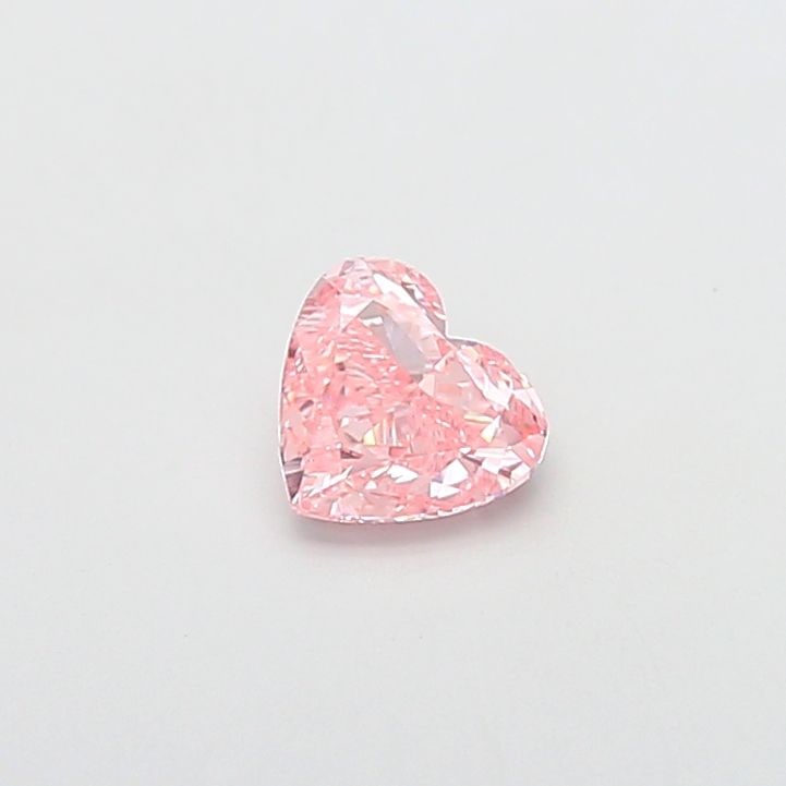 Loose Diamond - HEART 0.91ct Fancy Vivid Pink VS1: Loose Diamond - HEART 0.91ct Fancy Vivid Pink VS1 Source: This is a real non-mined Diamond that has been grown in a lab Shape: HEART Carats: 0.91 Color: Fancy Vivid Pink Certification: IGI Video: