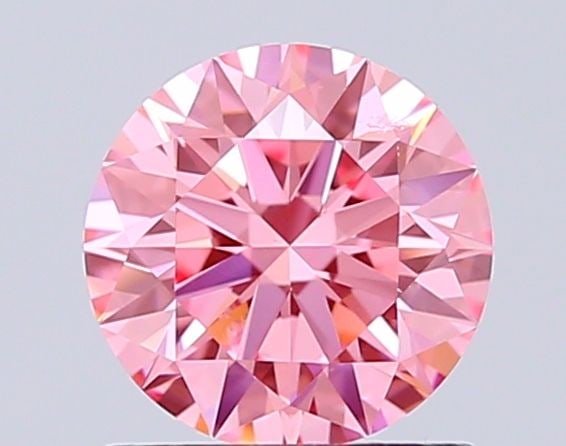 Ideal Loose Diamond - ROUND 1.03ct Fancy Vivid Pink VVS2: Ideal Loose Diamond - ROUND 1.03ct Fancy Vivid Pink VVS2 Source: This is a real non-mined Diamond that has been grown in a lab Shape: ROUND Carats: 1.03 Color: Fancy Vivid Pink Certification: IGI Vide