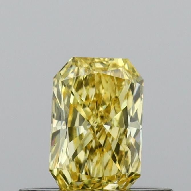 Loose Diamond - RADIANT 0.38ct Fancy Vivid Yellow VS2: Loose Diamond - RADIANT 0.38ct Fancy Vivid Yellow VS2 Source: This is a real non-mined Diamond that has been grown in a lab Shape: RADIANT Carats: 0.38 Color: Fancy Vivid Yellow Certification: IGI Vid