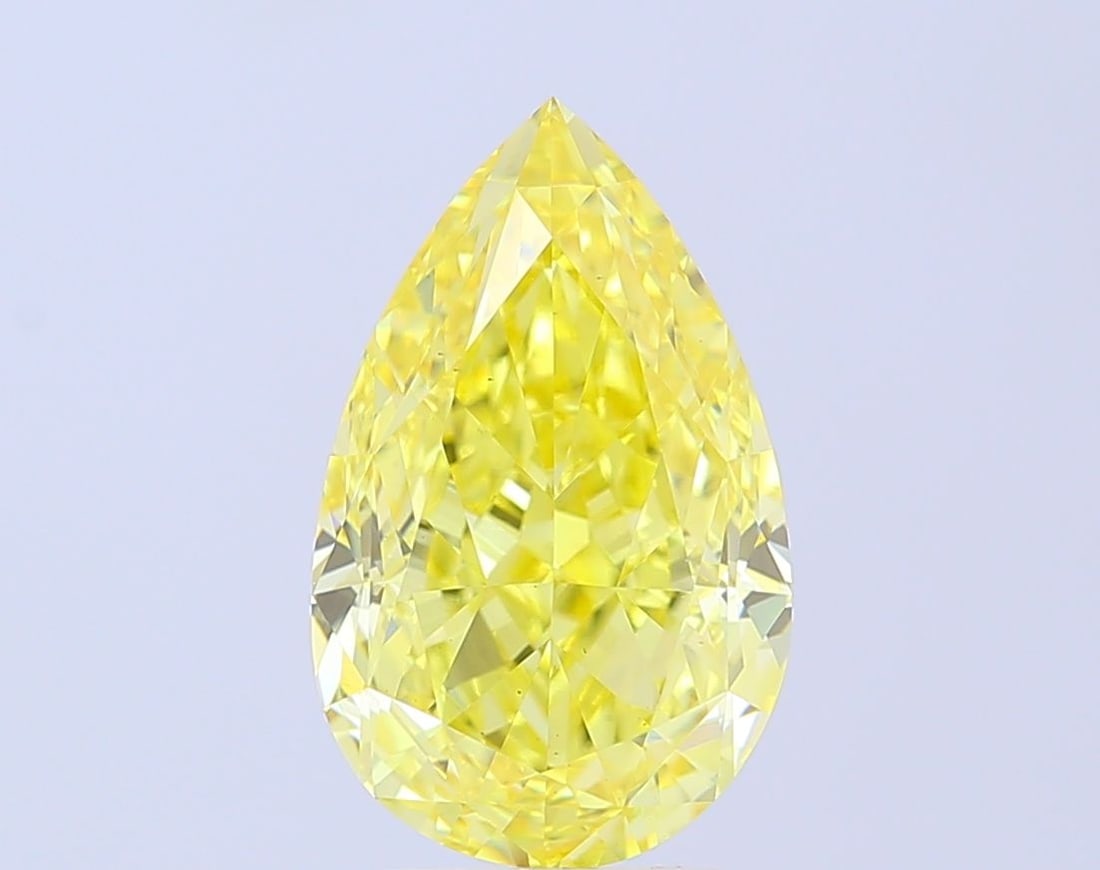 Loose Diamond - PEAR 5.06ct Fancy Vivid Yellow VS1: Loose Diamond - PEAR 5.06ct Fancy Vivid Yellow VS1 Source: This is a real non-mined Diamond that has been grown in a lab Shape: PEAR Carats: 5.06 Color: Fancy Vivid Yellow Certification: IGI The Diamo