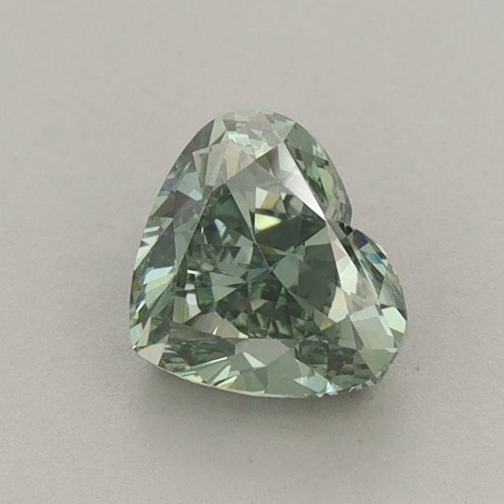 Loose Diamond - HEART 0.94ct Fancy Vivid Green VS1: Loose Diamond - HEART 0.94ct Fancy Vivid Green VS1 Source: This is a real non-mined Diamond that has been grown in a lab Shape: HEART Carats: 0.94 Color: Fancy Vivid Green Certification: IGI The Diamo