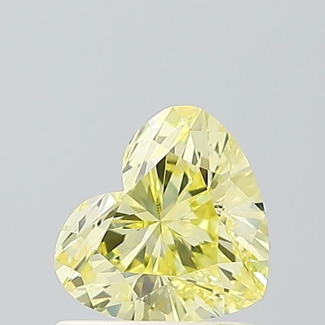 Loose Diamond - HEART 1.0ct Fancy Intense Yellow VS2: Loose Diamond - HEART 1.0ct Fancy Intense Yellow VS2 Source: This is a real non-mined Diamond that has been grown in a lab Shape: HEART Carats: 1.0 Color: Fancy Intense Yellow Certification: IGI Video