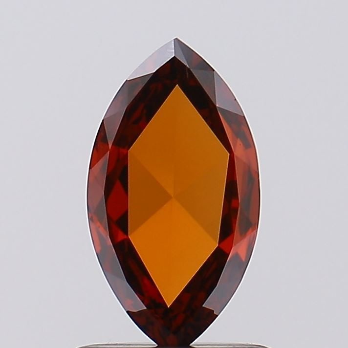 Loose Diamond - MARQUISE 0.63ct Fancy Vivid Orangey Red VS1: Loose Diamond - MARQUISE 0.63ct Fancy Vivid Orangey Red VS1 Source: This is a real non-mined Diamond that has been grown in a lab Shape: MARQUISE Carats: 0.63 Color: Fancy Vivid Orangey Red Certificat