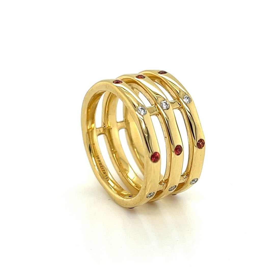 Ippolita Glamazon 18k Yellow Gold Ring with Orange Sapphire and Diamond Size 6.5: Ippolita Glamazon 18k Yellow Gold Ring with Orange Sapphire and Diamond Size 6.5 Pre-owned Ippolita Glamazon band ring in 18k yellow gold with a sculptural triple-band design. The ring is accented wit