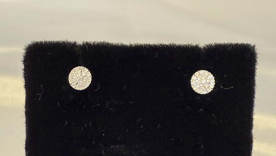 French 18K White Gold Diamond Stud Earrings Pair: French 18K White Gold Diamond Stud Earrings Pair A pair of French 18K white gold diamond stud earrings with finely detailed workmanship. These pre-owned earrings are fully signed and hallmarked. Speci