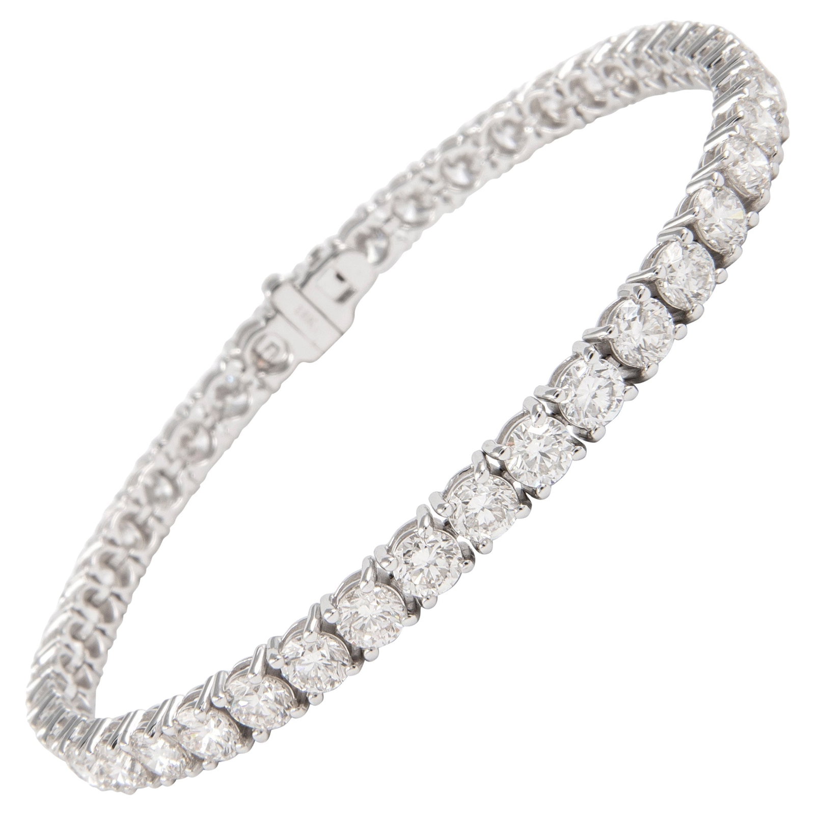 18k White Gold Diamond Tennis Bracelet 9.88ct: 18k White Gold Diamond Tennis Bracelet 9.88ct Diamond tennis bracelet set with 42 round brilliant diamonds totaling 9.88 ct in 18k white gold. The diamonds are approximately G color and VS clarity in 