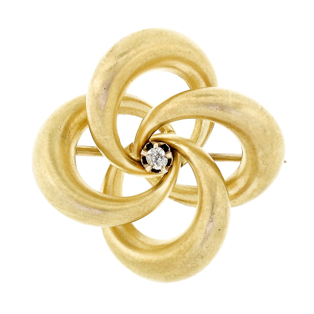 Art Nouveau 10k Yellow Gold Love Knot Brooch with Old Mine Cut Diamond: Art Nouveau 10k Yellow Gold Love Knot Brooch with Old Mine Cut Diamond Antique Art Nouveau brooch featuring a puffed infinity love knot design with an old mine cut diamond at the center. Crafted in so