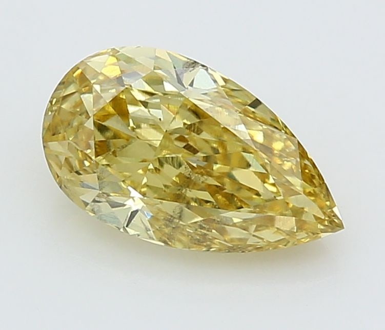 Loose Diamond - PEAR 2.09ct Fancy Vivid Yellow VS2: Loose Diamond - PEAR 2.09ct Fancy Vivid Yellow VS2 Source: This is a real non-mined Diamond that has been grown in a lab Shape: PEAR Carats: 2.09 Color: Fancy Vivid Yellow Certification: IGI Video: