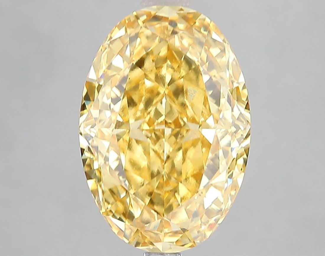 Loose Diamond - OVAL 5.08ct Fancy Vivid Yellow VS1: Loose Diamond - OVAL 5.08ct Fancy Vivid Yellow VS1 Source: This is a real non-mined Diamond that has been grown in a lab Shape: OVAL Carats: 5.08 Color: Fancy Vivid Yellow Certification: IGI Video: