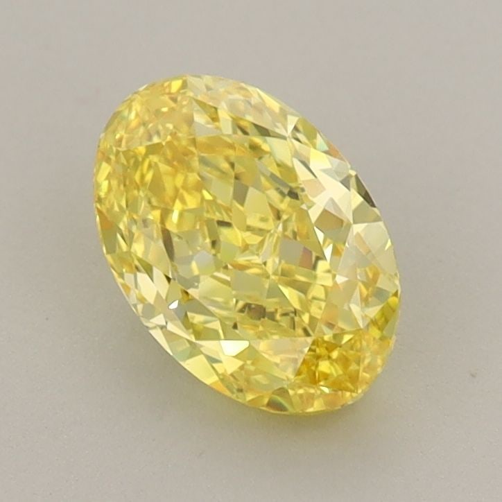 Loose Diamond - OVAL 1.03ct Fancy Vivid Yellow VS1: Loose Diamond - OVAL 1.03ct Fancy Vivid Yellow VS1 Source: This is a real non-mined Diamond that has been grown in a lab Shape: OVAL Carats: 1.03 Color: Fancy Vivid Yellow Certification: IGI Video: