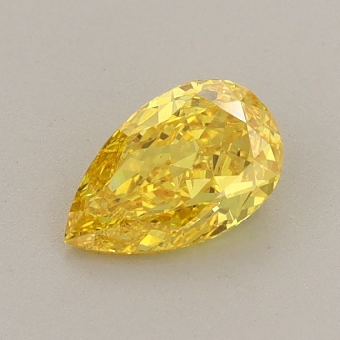 Loose Diamond - PEAR 0.52ct Fancy Vivid Yellow VS2: Loose Diamond - PEAR 0.52ct Fancy Vivid Yellow VS2 Source: This is a real non-mined Diamond that has been grown in a lab Shape: PEAR Carats: 0.52 Color: Fancy Vivid Yellow Certification: IGI Video: