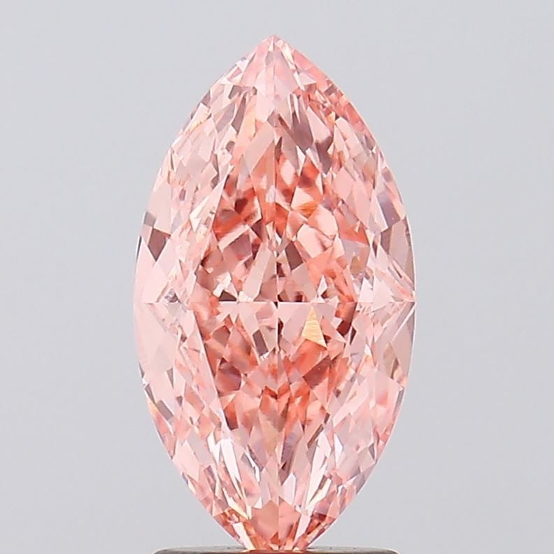 Loose Diamond - MARQUISE 2.56ct Fancy Vivid Pink VVS2: Loose Diamond - MARQUISE 2.56ct Fancy Vivid Pink VVS2 Source: This is a real non-mined Diamond that has been grown in a lab Shape: MARQUISE Carats: 2.56 Color: Fancy Vivid Pink Certification: IGI Vide